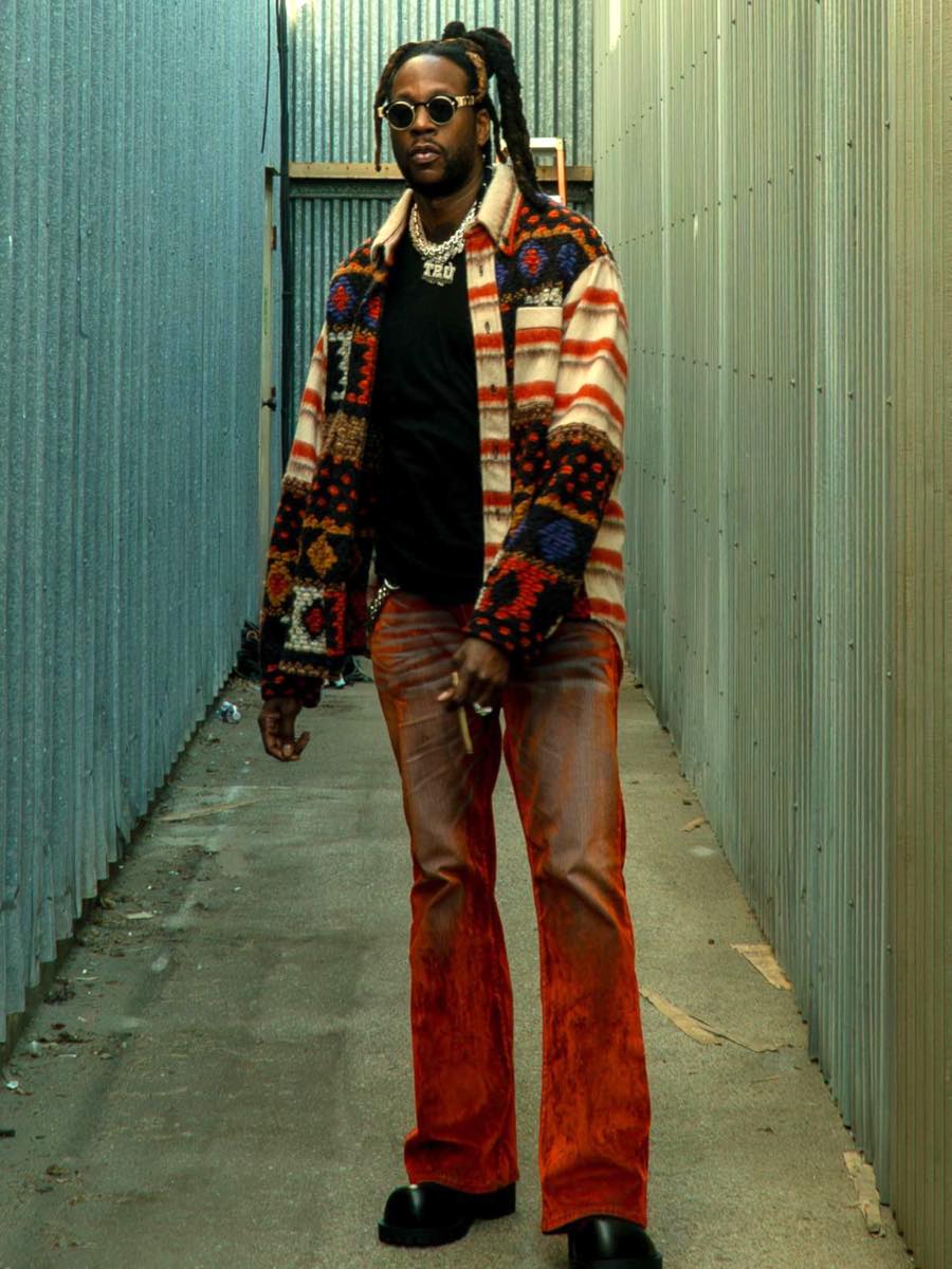2 Chainz: Patterned Knit Overshirt, Orange Velvet Jeans & Balenciaga Boots