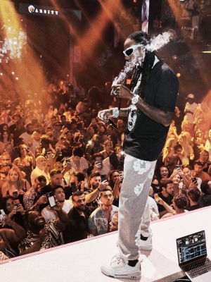 2 Chainz Wearing Burberry Sunglasses With A Pinhead T Shirt Denim Tears Sweatpants And Louis Vuitton Skate Sneakers