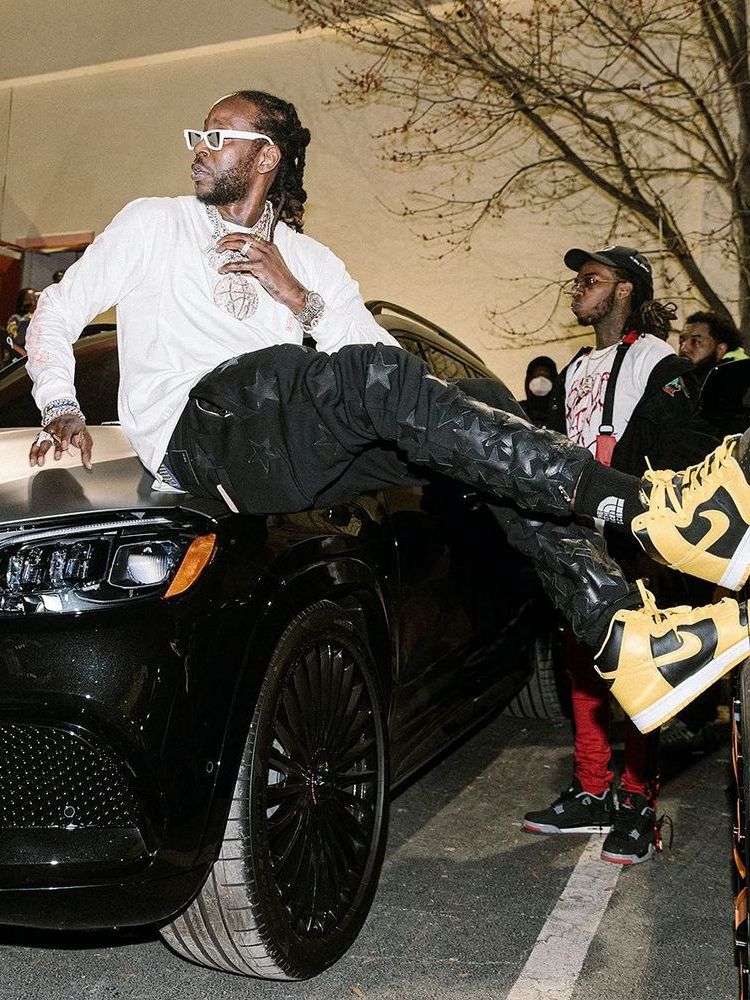 2 Chainz Wearing a Louis Vuitton, Chrome Hearts, Amiri, & Gucci x TNF Outfit