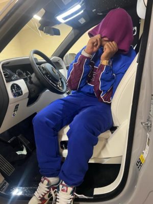 42 Dugg Wearing A Supreme Track Jacket Trackpants Nike Sneakers And Ap Watch
