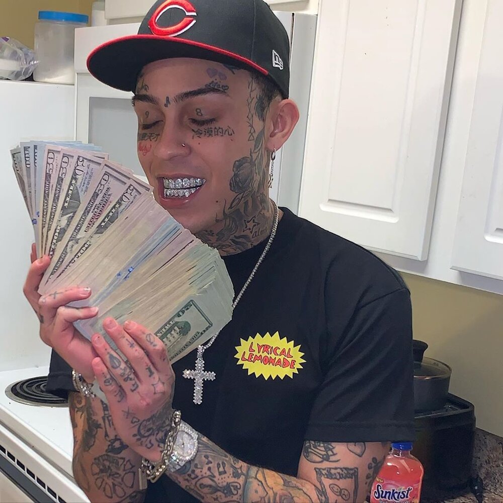 Lil Skies Admires His Cash In a Cincinatti Reds 59Fifty and Lyrical Lemonade Tee