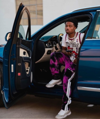 Roddy Ricch Wearing A Vince Carter Jersey With Palm Angels Pants Inside His Bentley Truck