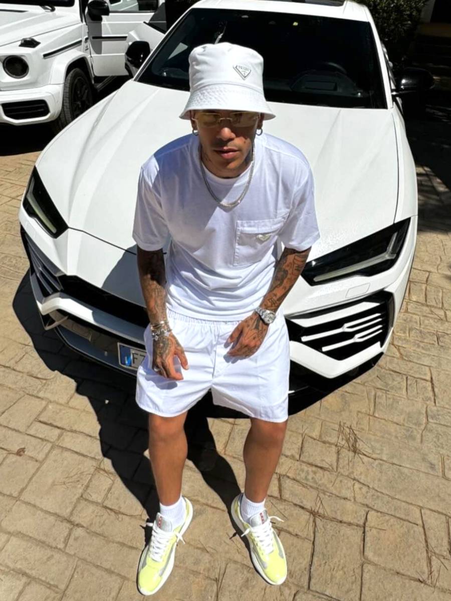 Sfera Ebbasta: Full White Prada Bucket Hat, Cargo Pocket Tee & Americas Cup Sneakers Outfit