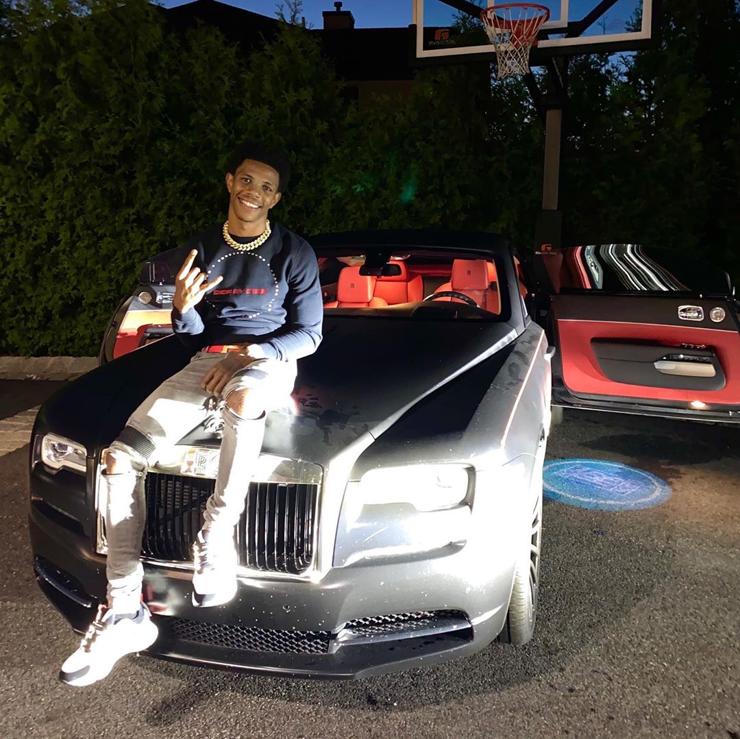 A Boogie Sits Atop His Rolls In Amiri Jeans & a Dior Sweatshirt and Sneakers