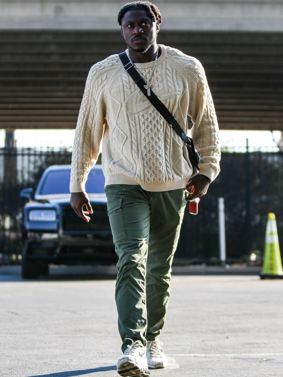 AJ Brown: Nike Knit Sweater, Olive Cargo Pants & Caged Sneakers