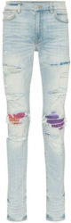 Amiri Light Wash Ripped Jeans With Purple Red And Blue Under Patches Worn By Lil Baby