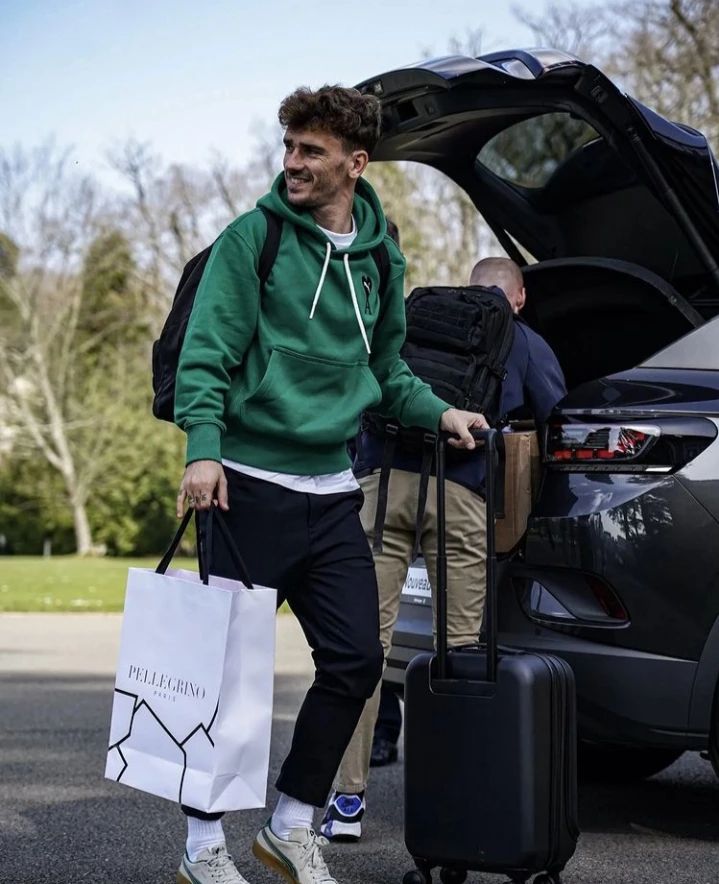 Antoine Griezmann Wearing an AMI Paris x Puma Hoodie & Sneakers at France  Training | Incorporated Style