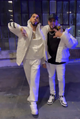 Anuel Aa Wearing A Louis Vuitton Quilted Vest With An Off White Hoodie And Sweatpants