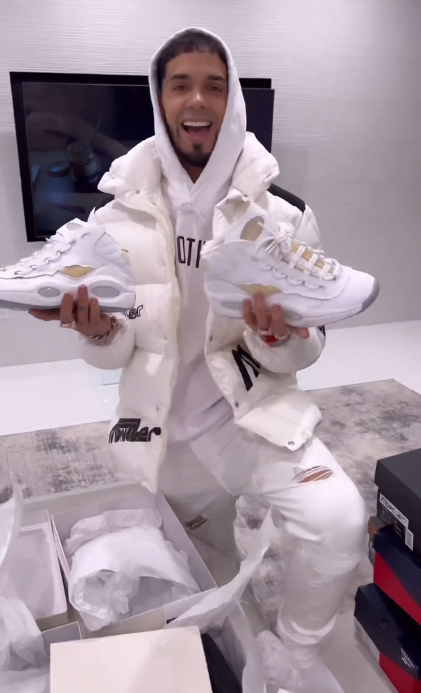 Anuel AA Shows Off The Reebok x Margiela Collab In a White Moncler & Amiri Outfit