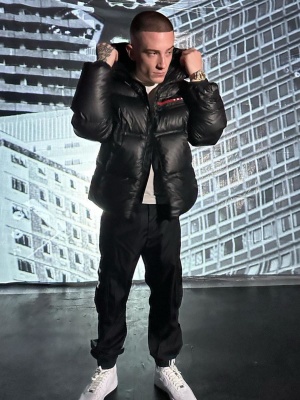Arrdee Wearing A Prada Linea Rossa Puffer With Buckled Cargo Pants And Nike Sneakers