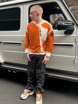 Arrdee Wearing A Stone Island Tiedye Shirt With Paint Splatter Pants And Orange Gradient Sneakers