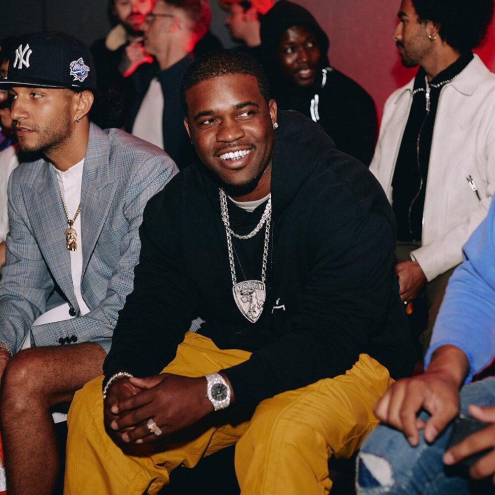 A$AP Ferg Wears an ACW* Hoodie and Pants To Their London Fashion Show