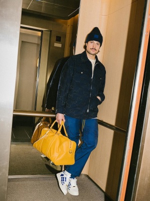Auston Matthews Wearing An Acne Studios Hat With A Gucci Jacket Amiri Sneakers And Orange Leather Bag