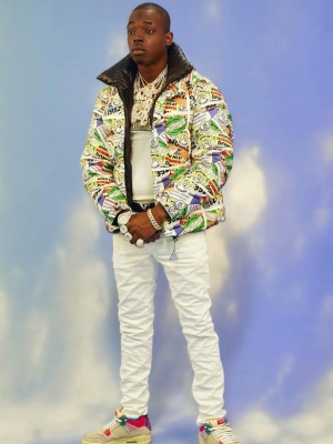 Bobby Shmurda Wearing A Moncler Cartoon Puffer Jacket With A Black Louis Vuitton Belt And Jordan X Union Sneakers