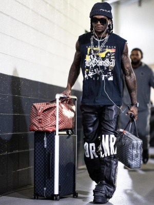 Ceedee Lamb Wearing A Marni Beanie With A Led Zeppelin Sleeveless Tee Who Decides War Pants Dior Sneakers And A Louis Vuitton Luggage