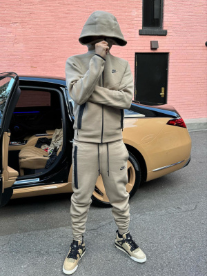 Central Cee Wearing A Nike Sportswear Tech Beige Zip Hoodie And Joggers With Matching Jordan 4s