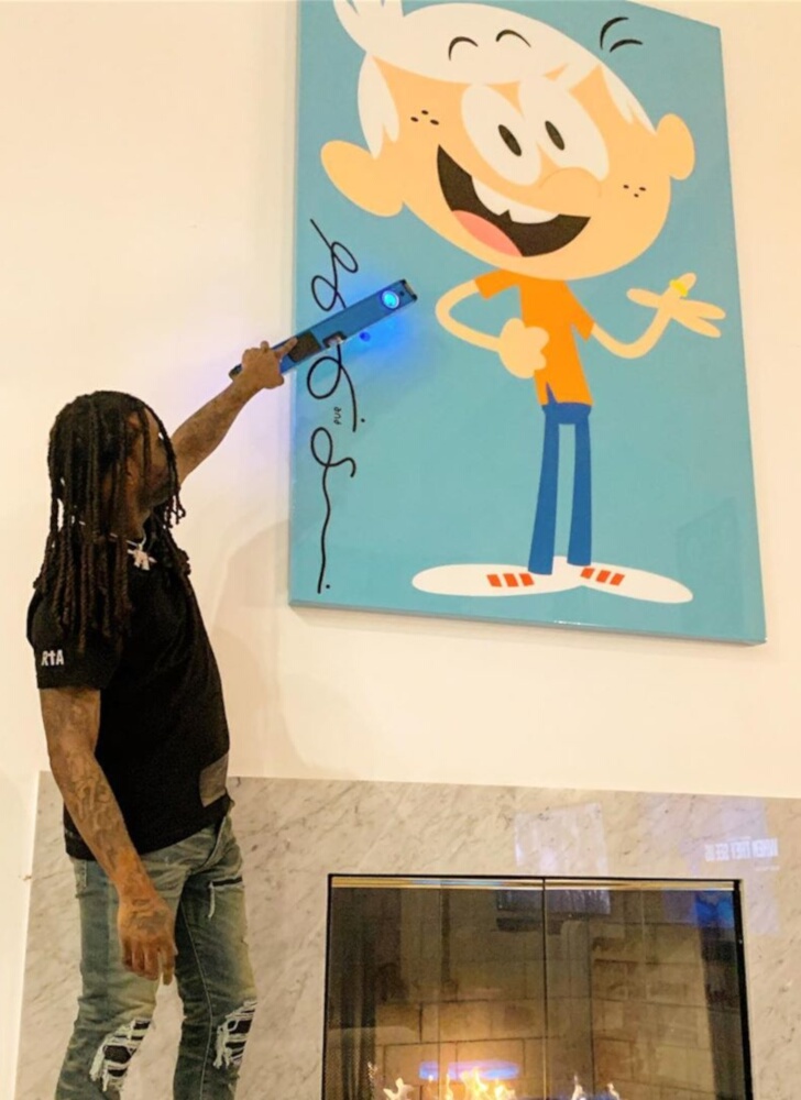 Chief Keef Hangs a Shelby and Sandy Print In a RtA Shirt, & Amiri Jeans