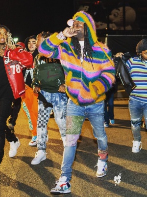 Chief Keef Wearing A Celine Striped Mohair Zip Hoodie With Amiri Indigo Bandana Art Patch Jeans And Nike Dunks