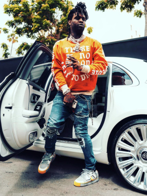 Chief Keef Wearing A Saint Mxxxxxx Sweatshirt With Amiri Jeans And Mschf Sneakers