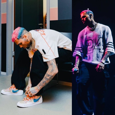 Chris Brown Wearing A White 24 Knit Jersey With An Acw T Shirt And Nike X Sacai X Kaws Blazers