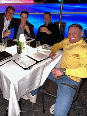 Conor Mcgregor Promotes His Whiskey In A Dolce And Gabbana Yellow Sweater Patek Philippe Watch And Fendi Sneakers