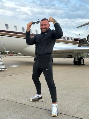 Conor Mcgregor Versace Sunglasses Nike Repel Jacket Nike Trackpants Nike Gradient Sneakers