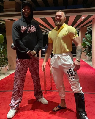 Conor Mcgregor Wearing A Dolce Gabbana Polo And Versace Sandals