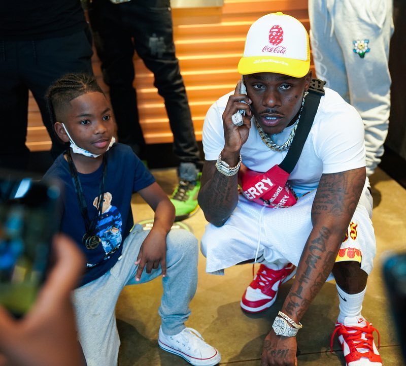 DaBaby Wearing a Red and Yellow BAPE x Coke, Burberry, & Nike Outfit