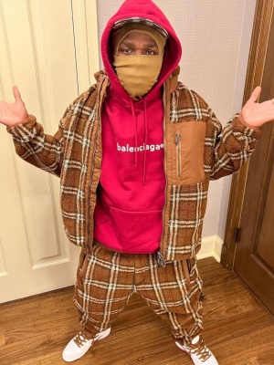Dababy Wearing A Burberry Brown Check Wool Hat Fleece Jacket And Sweatpants With A Balenciaga Hoodie And Jordan 1 Sneakers