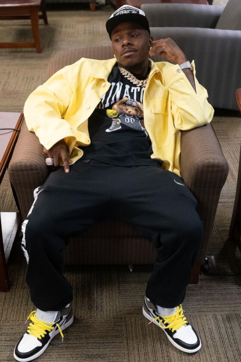 DaBaby Relaxes In a Dior Overshirt, Chinatown Market Tee, Chrome Hearts Hat, & Jordan 1s