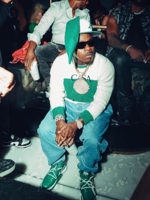 Dababy Wearing A Green Bunny Ears Hat With A Casablanca Sweater And Nike X Off White Sneakers
