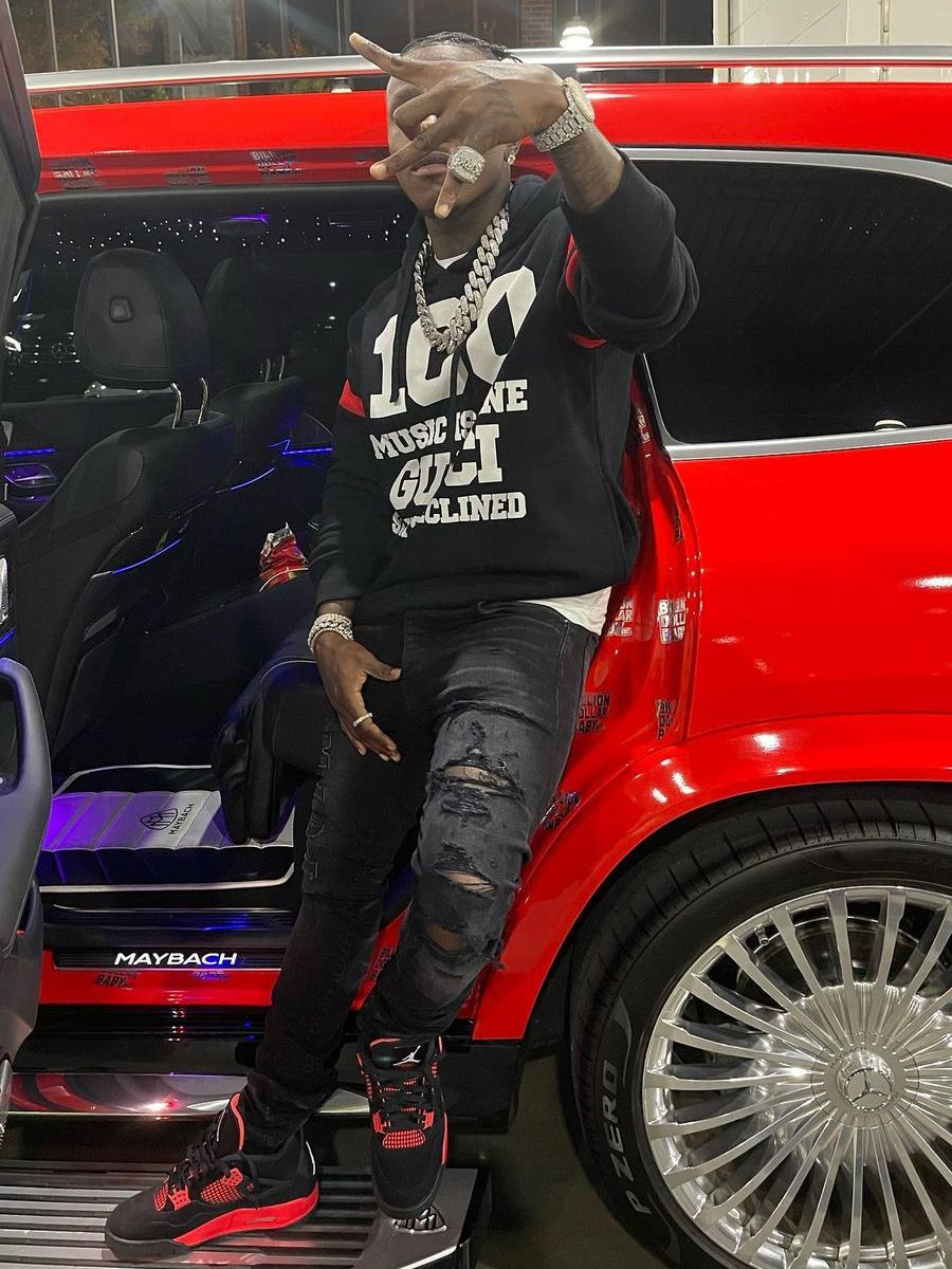 DaBaby Wearing a Gucci '100' Hoodie With Amiri Jeans & Unreleased Jordan 4s