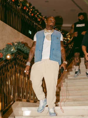Dababy Wearing A Nike Head Warmer With A Carhartt Wip Vest And Nike Sneakers