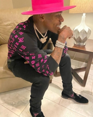 Dababy Wearing A Pink Fedora Lv Sweater And Gucci Socks