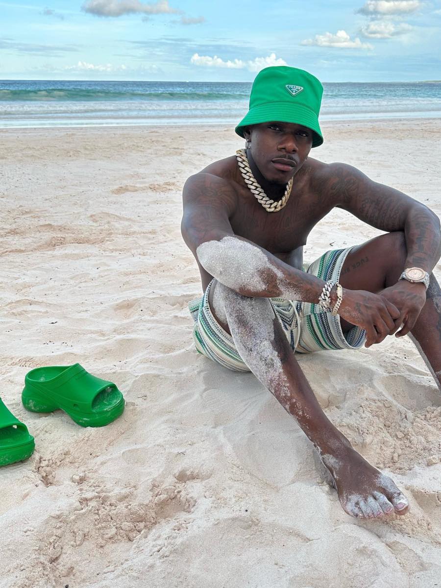 DaBaby Wearing Striped KITH Shorts With a Green Bucket Hat & Crocs ...