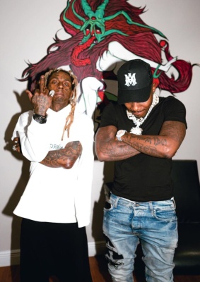 Dababy Wearing An Amiri Hat And Jeans With Lil Wayne In A Maison Margiela Hoodie