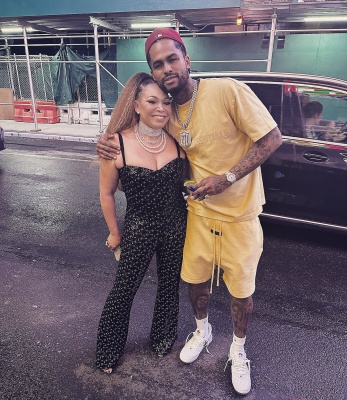 Dave East Wearing An Essentials Tuscan Yellow Tee And Shorts With Nike Af1s