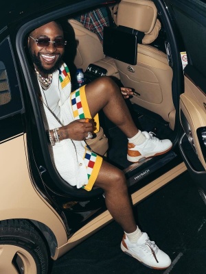 Davido Wearing A Casablanca White Checkered Shirt And Shorts With Off White Sneakers