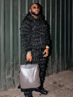Davido Wearing A Mjb Dragon Spike Hoodie And Pants With A Goyard Bag And Nike Floral Af1s