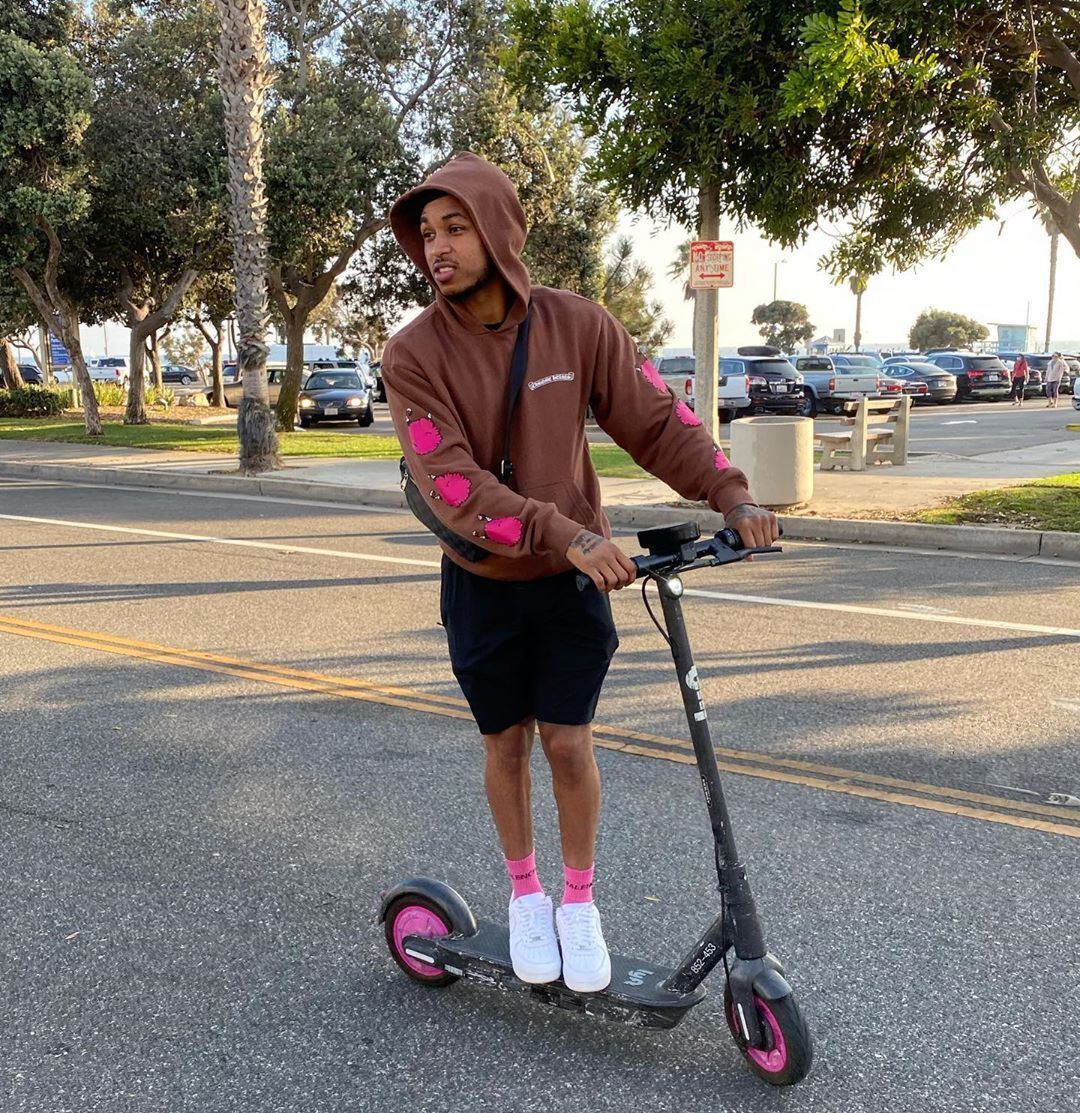 DDG Scooters Around In a Chrome Hearts Hoodie & Louis Vuitton Bag