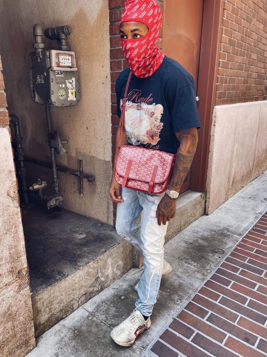 DDG Wearing a Goyard Bag With a RHUDE Tee & Gucci Sneakers