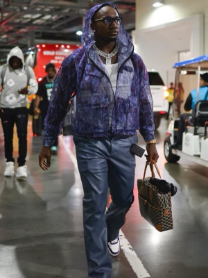 Deebo Samuel Wearing A South2west8 Purple Camo Vest Goyard Bag And Chrome Hearts Sunglasses