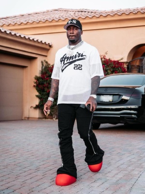 Deebo Samuel Wearing An Amiri Mesh Tee With Rick Owens Bolan Jeans And Mschf Boots