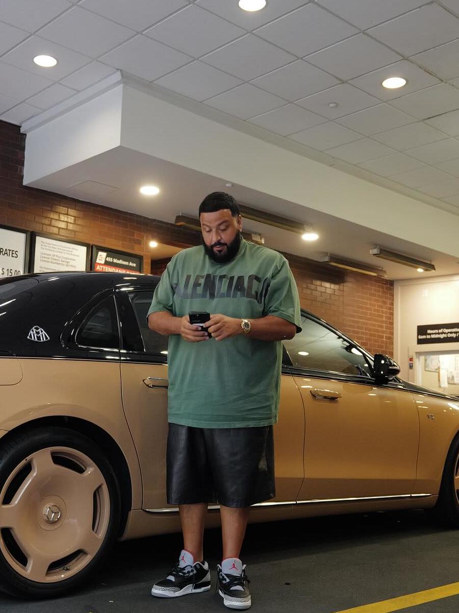 DJ Khaled: Balenciaga Green Logo Tee, Rolex Daytona Watch, & Jordan 3 Sneakers