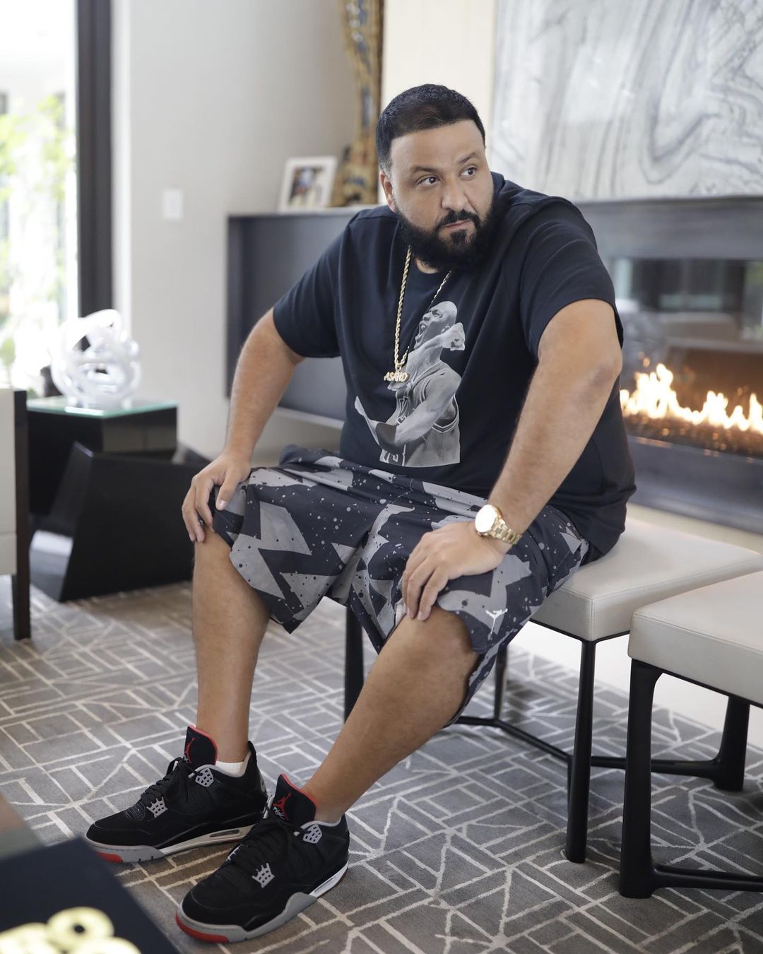 DJ Khaled Wearing a Jordan Photo Tee With Matching Shorts and 3s