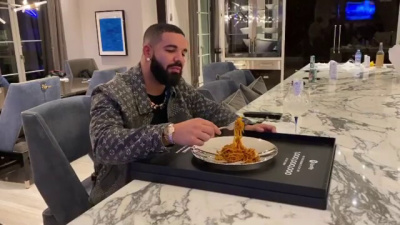 Drake Eats Off His 1b Spotify Plaque In A Louis Vuitton X Nigo Black Denim Jacket