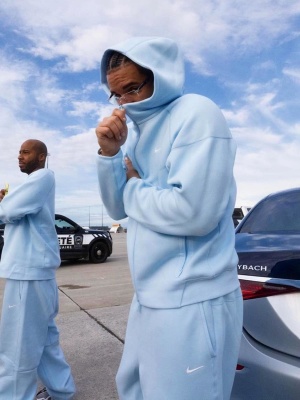 Drake Wearing A Nike X Nocta Light Blue Zip Hoodie And Joggers