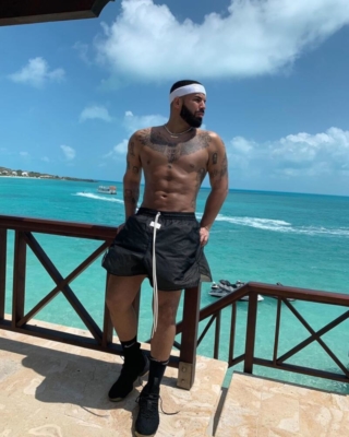 Drake Wearing Nike X Fear Of God Black Shorts And Nike Lebron Black Gum Sneakers