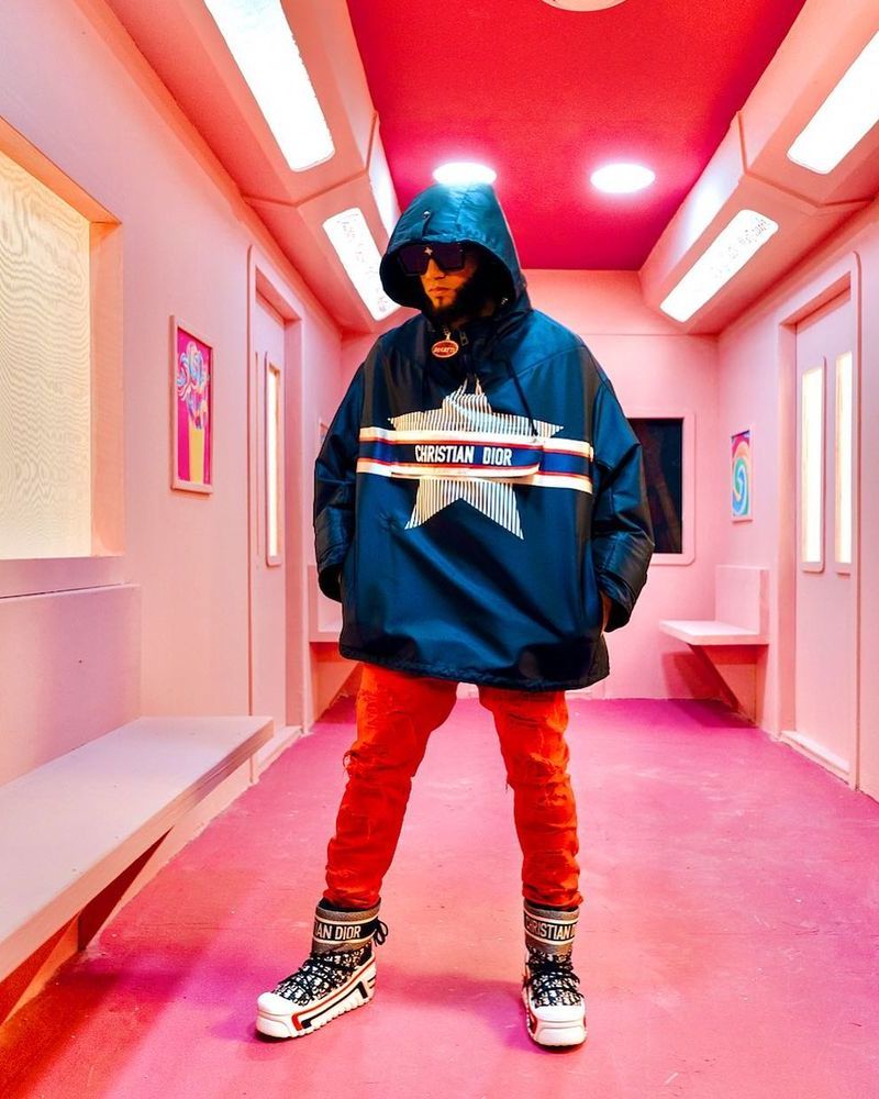 El Alfa Wearing a 'DiorAlps' Anorak Jacket & Snow Boots With Dsquared2 Jeans