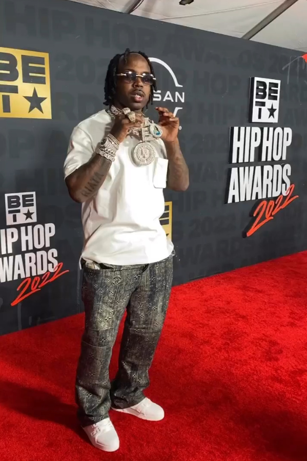 EST Gee Attends the 2022 BET Hip Hop Awards In Full Louis Vuitton Outfit